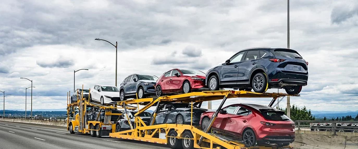 Vehicles on haulaway carrier